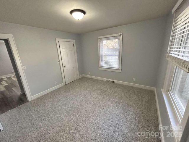 view of carpeted spare room