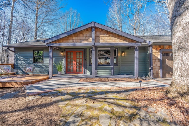 view of front facade with french doors and a garage