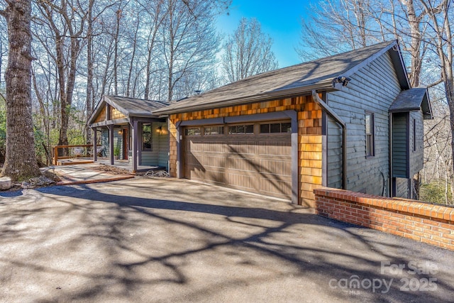 view of front of property featuring a garage