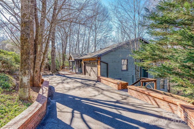 exterior space with a garage