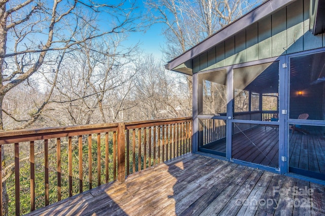 wooden terrace with a sunroom