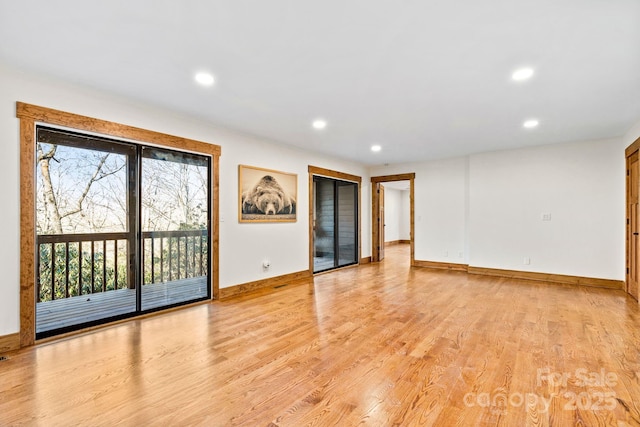 spare room featuring light hardwood / wood-style flooring