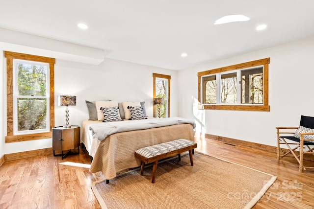 bedroom with hardwood / wood-style flooring