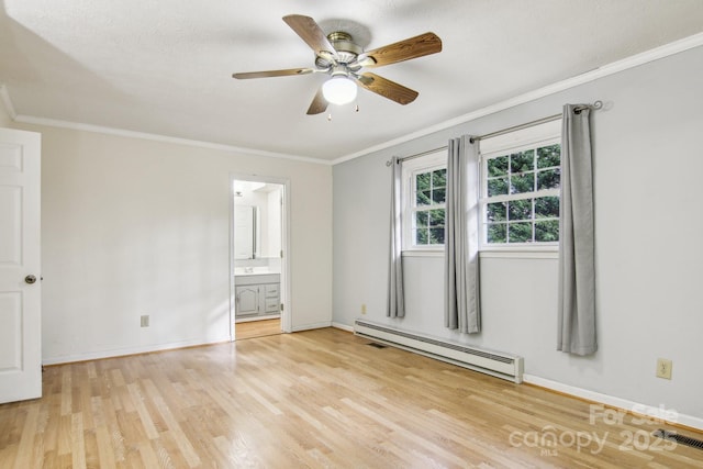 unfurnished bedroom featuring crown molding, ensuite bath, ceiling fan, baseboard heating, and light hardwood / wood-style floors