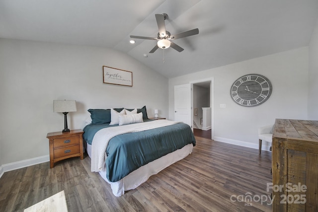 bedroom featuring ceiling fan, dark wood-type flooring, and vaulted ceiling