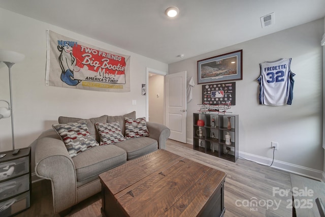 living room with hardwood / wood-style floors