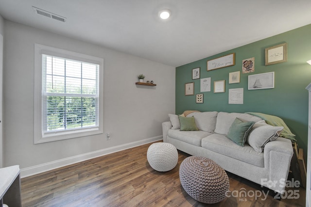 living room with dark wood-type flooring