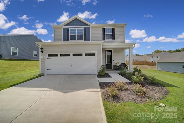 view of front of home featuring a garage and a front yard