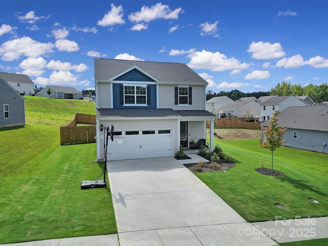 view of property featuring a garage and a front lawn