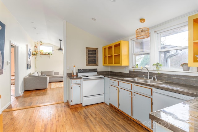 kitchen with ceiling fan, sink, lofted ceiling, white appliances, and light wood-type flooring