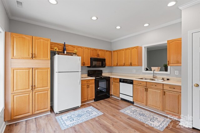 7019 Walnut Ridge Ct, Charlotte, NC 28217 - kitchen featuring black appliances, a sink, light countertops, crown molding, and recessed lighting