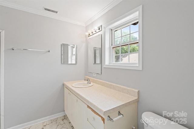 7019 Walnut Ridge Ct, Charlotte, NC 28217 - bathroom featuring toilet, vanity, marble look tile flooring, baseboards, and ornamental molding