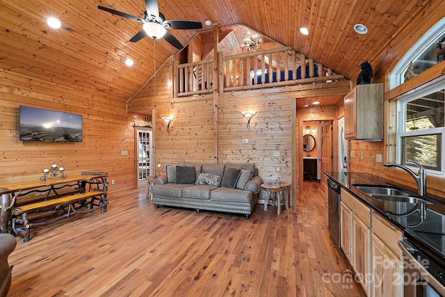 living room featuring wood ceiling, wood walls, and sink