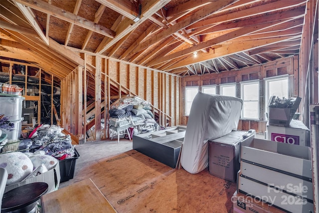 misc room with lofted ceiling