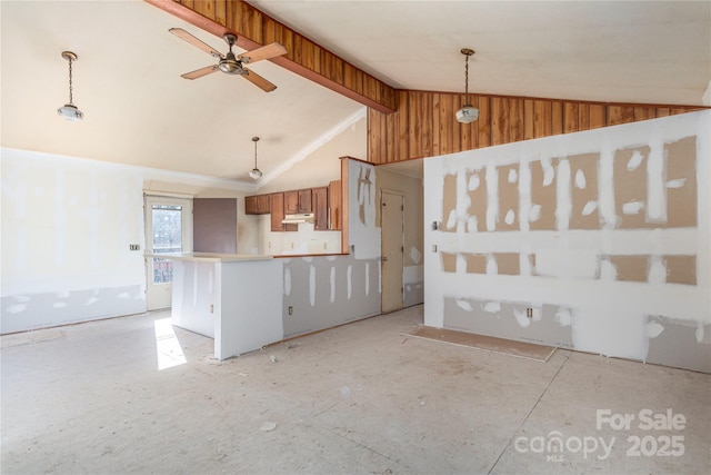 kitchen with vaulted ceiling with beams, decorative light fixtures, and ceiling fan