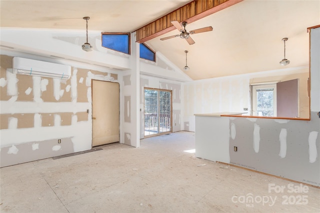 spare room featuring an AC wall unit, ceiling fan, beamed ceiling, and high vaulted ceiling