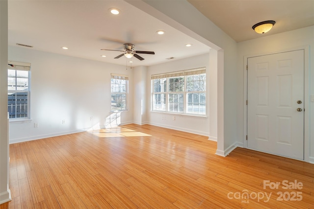 entrance foyer with light hardwood / wood-style flooring and ceiling fan