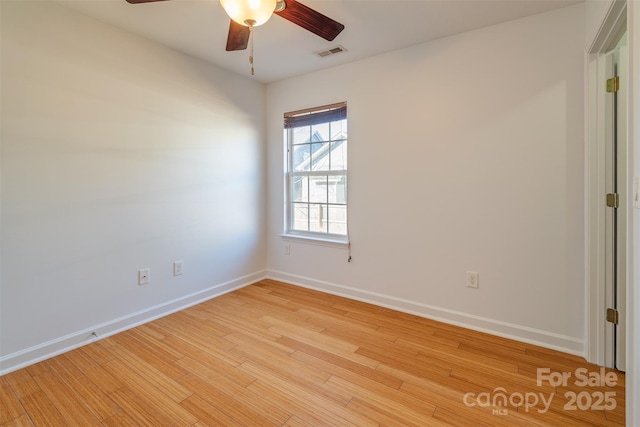 unfurnished room with ceiling fan and light hardwood / wood-style floors