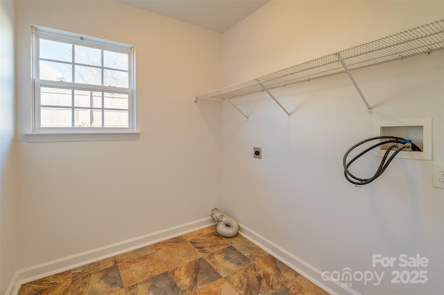 washroom with washer hookup and electric dryer hookup