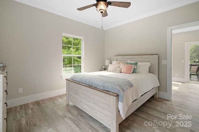 bedroom with ceiling fan, light wood-type flooring, and ornamental molding