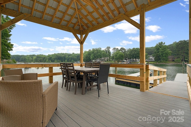 wooden terrace with a water view