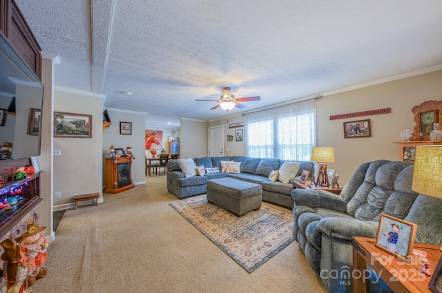 living room featuring a textured ceiling, ceiling fan, and ornamental molding