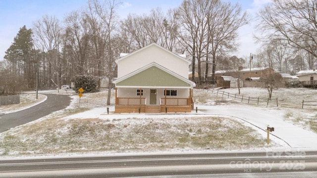 view of property featuring a porch