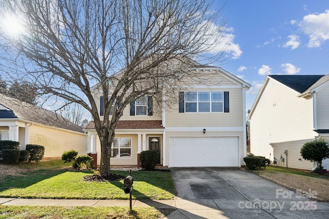 view of property with a garage and a front lawn