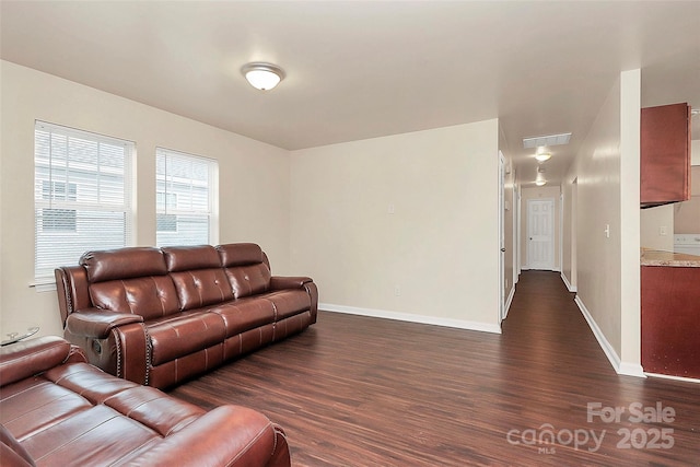 living room featuring dark hardwood / wood-style flooring