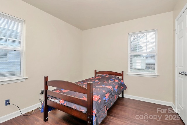 bedroom featuring dark wood-type flooring