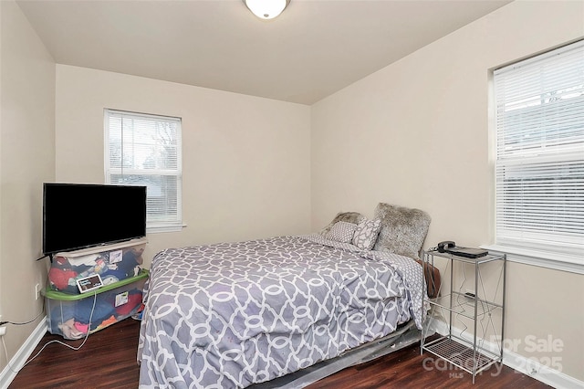 bedroom featuring wood-type flooring