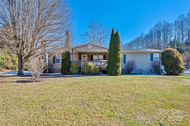 view of front facade with a porch and a front yard