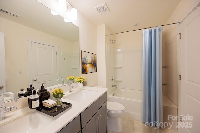 full bathroom with shower / bath combination with curtain, vanity, toilet, and tile patterned floors