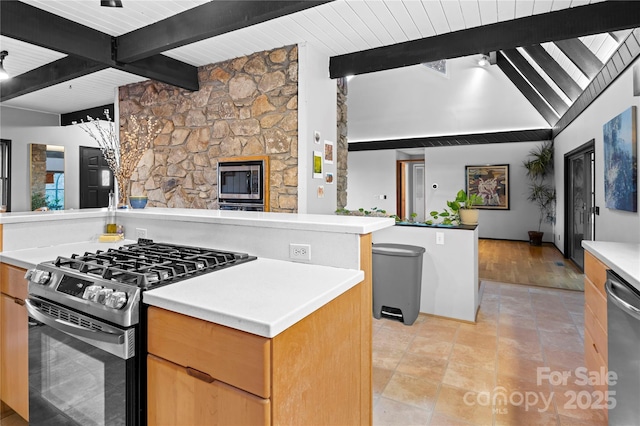 kitchen featuring kitchen peninsula, appliances with stainless steel finishes, lofted ceiling with beams, and light tile patterned floors