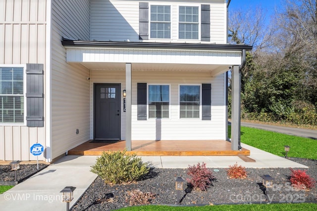 property entrance featuring covered porch