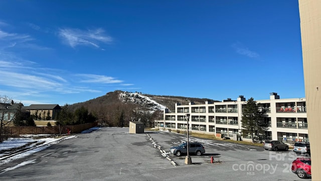 view of building exterior featuring a mountain view