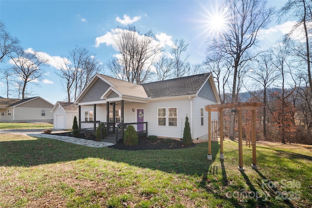 single story home featuring a garage, a pergola, and a front yard