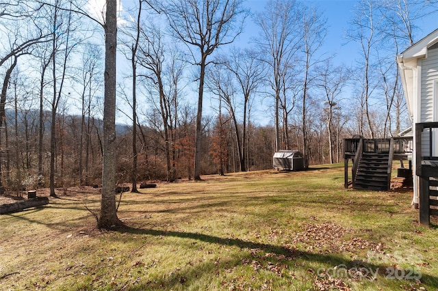 view of yard with a deck