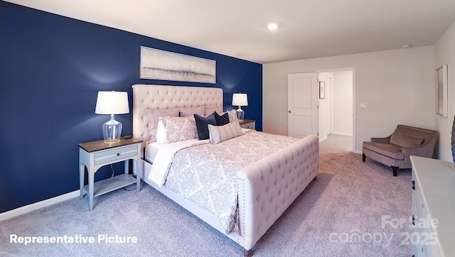 bedroom with light colored carpet