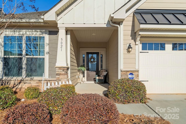 entrance to property featuring a garage