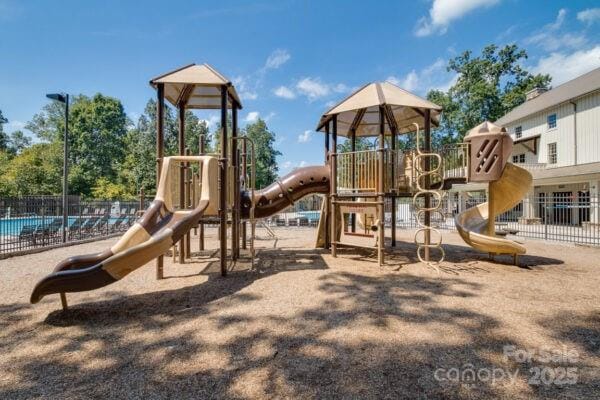community playground featuring fence