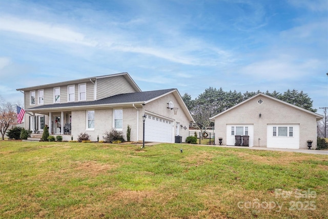 view of front of property featuring covered porch, a garage, and a front lawn