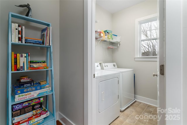 laundry room featuring washing machine and dryer