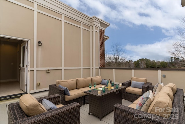 wooden deck featuring an outdoor hangout area