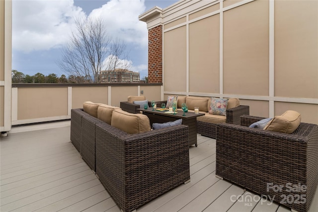 deck featuring outdoor lounge area