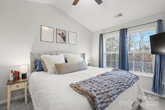 carpeted bedroom featuring ceiling fan and lofted ceiling