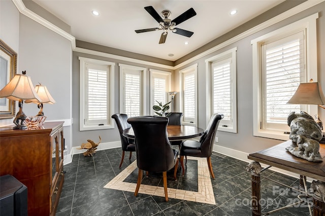 dining space featuring ceiling fan