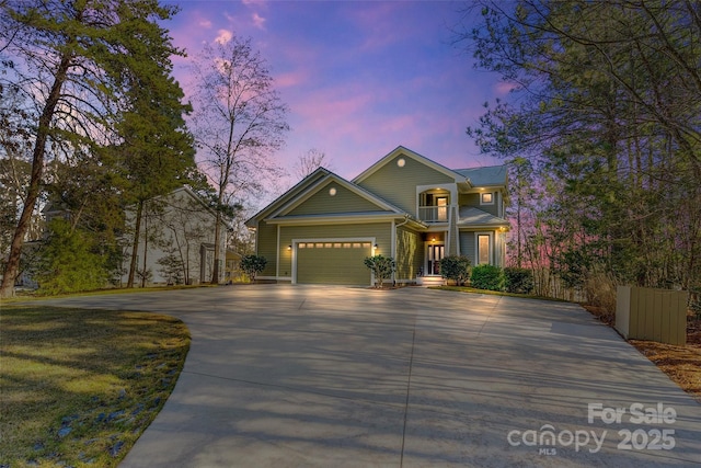 view of front of property with a garage