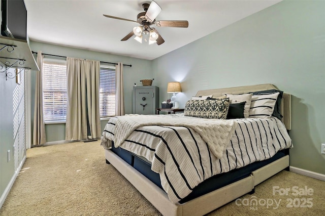 bedroom with ceiling fan and carpet floors