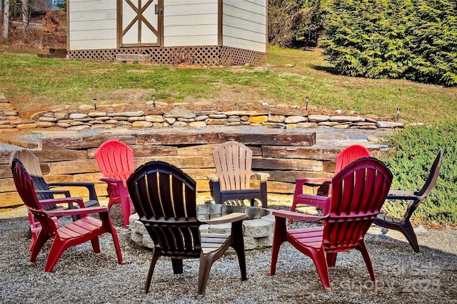 view of patio / terrace featuring a storage unit